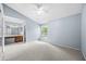 Bright main bedroom with large window and ensuite bath at 2719 Candlewood Ct, Apopka, FL 32703