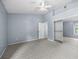 Open main bedroom with ensuite bath at 2719 Candlewood Ct, Apopka, FL 32703