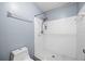 A tiled shower with a hand-held shower head and a soap dish at 2719 Candlewood Ct, Apopka, FL 32703