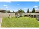 This backyard includes a playset, and a lush lawn perfect for Gathering fun and outdoor activities at 2896 Matera Dr, St Cloud, FL 34771