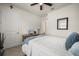 Comfortable bedroom features a light color palette and a large window for ample natural light at 2896 Matera Dr, St Cloud, FL 34771