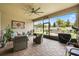 Covered patio area with outdoor furniture and views of the backyard at 2896 Matera Dr, St Cloud, FL 34771