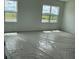 Bright bedroom with two windows offering ample natural light and serene views at 2971 Embark Trail, St Cloud, FL 34771