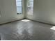 Carpeted bedroom with two windows allowing natural light at 2971 Embark Trail, St Cloud, FL 34771