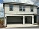 Charming two-story home with a spacious two-car garage and clean modern design at 2971 Embark Trail, St Cloud, FL 34771