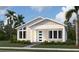 Inviting single-story home featuring a covered porch, modern front door, and well-manicured landscaping at 2971 Embark Trail, St Cloud, FL 34771