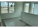 Well-lit room with large windows offering natural light and views of the surrounding neighborhood at 2971 Embark Trail, St Cloud, FL 34771