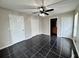 Bedroom with tile flooring and multiple closets at 306 Snook Way, Kissimmee, FL 34759