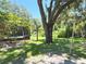 Nice backyard with a swing set, and partially screened pool area at 3100 Pine Needle Trl, Kissimmee, FL 34746