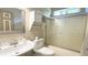 Bathroom featuring pedestal sink and shower with sliding glass door at 3100 Pine Needle Trl, Kissimmee, FL 34746