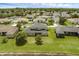 Aerial view of the home showcases the spacious backyard and proximity to other homes at 3131 Regal Darner Dr, Kissimmee, FL 34744