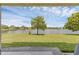 Expansive backyard view features a large lake and fountain, perfect for relaxing outdoors at 3131 Regal Darner Dr, Kissimmee, FL 34744