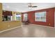 Well-lit dining area with backyard views, tile flooring, and seating for four at 3131 Regal Darner Dr, Kissimmee, FL 34744