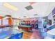 Fun game room with pool table, ping pong, and arcade games for residents' entertainment at 3131 Regal Darner Dr, Kissimmee, FL 34744