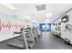 Bright fitness center featuring multiple treadmills, ceiling fans, and wall-mounted televisions at 3131 Regal Darner Dr, Kissimmee, FL 34744