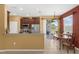 Bright kitchen with stainless steel appliances, a breakfast bar, and view of the lanai at 3131 Regal Darner Dr, Kissimmee, FL 34744