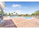 Sparkling community pool with lounge chairs for residents to relax and enjoy the sun at 3131 Regal Darner Dr, Kissimmee, FL 34744