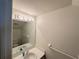 Bathroom featuring a large mirror, vanity with sink, and neutral decor at 3352 Hamlet Loop, Winter Park, FL 32792