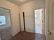 Bedroom showing neutral colors and doors leading to the bathroom and closet at 3352 Hamlet Loop, Winter Park, FL 32792