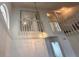 Bright living room featuring high ceilings, lots of natural light, and a decorative chandelier at 3352 Hamlet Loop, Winter Park, FL 32792