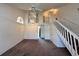 Spacious living room featuring high ceilings, lots of natural light, and a staircase at 3352 Hamlet Loop, Winter Park, FL 32792