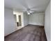 Spacious bedroom with large windows, carpet flooring, and neutral color palette at 3352 Hamlet Loop, Winter Park, FL 32792