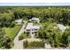 Spacious modern home with expansive grounds and mature landscaping, aerial view at 350 Northwind Rd, Maitland, FL 32751