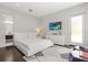 Bright bedroom features minimalist decor, hard floors, and a wall-mounted television at 350 Northwind Rd, Maitland, FL 32751