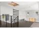 Bright entryway with modern light fixtures and a floating staircase at 350 Northwind Rd, Maitland, FL 32751