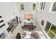 Open-concept design with soaring ceilings, large windows, and a seamless flow between living and dining areas at 350 Northwind Rd, Maitland, FL 32751