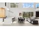 Spacious, open-concept living area with soaring ceilings and an abundance of natural light at 350 Northwind Rd, Maitland, FL 32751