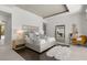 Elegantly designed main bedroom featuring a large bed, modern decor, and access to an outdoor view at 350 Northwind Rd, Maitland, FL 32751