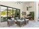 Open-air patio with a seating area and access to the indoor dining at 350 Northwind Rd, Maitland, FL 32751