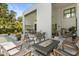 Relaxing outdoor patio with fire table and cozy seating arrangement at 350 Northwind Rd, Maitland, FL 32751