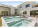 Backyard pool and patio with ample seating and lounge chairs at 350 Northwind Rd, Maitland, FL 32751