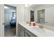 Bathroom featuring granite countertops, stainless steel faucet, with views into two bedrooms at 369 Ocean Course Ave, Davenport, FL 33896