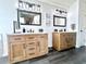Dual vanity bathroom featuring wooden cabinets, modern fixtures, and stylish mirrors at 3708 Beaver Ridge Dr, Orlando, FL 32829