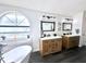Bathroom showcasing double vanities, modern fixtures, and a large window for natural light at 3708 Beaver Ridge Dr, Orlando, FL 32829