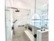 Spa-like walk-in shower with modern fixtures and a built-in bench at 3708 Beaver Ridge Dr, Orlando, FL 32829
