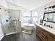 This bathroom features a soaking tub, walk-in shower, and a double sink vanity at 3708 Beaver Ridge Dr, Orlando, FL 32829