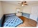 Cozy bedroom featuring wood floors, a ceiling fan, and neutral decor at 3708 Beaver Ridge Dr, Orlando, FL 32829