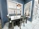 Cozy dining area featuring a table, chairs, and natural light at 3708 Beaver Ridge Dr, Orlando, FL 32829