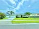 Charming single-story home features a well-manicured front lawn, mature trees, and a two-car garage at 3708 Beaver Ridge Dr, Orlando, FL 32829