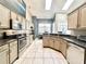 Modern kitchen equipped with stainless steel appliances, granite countertops, and lots of cabinet space at 3708 Beaver Ridge Dr, Orlando, FL 32829