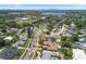 Aerial view featuring the property's surroundings, including mature trees and a distant view of the city at 3722 Neptune Dr, Orlando, FL 32804