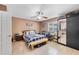 Inviting bedroom featuring a large bed, desk area, and closet space at 3722 Neptune Dr, Orlando, FL 32804