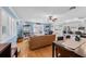Open floor plan with a living room, dining area, and kitchen that seamlessly connect for modern living and entertaining at 3722 Neptune Dr, Orlando, FL 32804