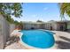 Beautiful pool area with brick pavers, covered patio, and lush landscaping for private outdoor entertainment at 3722 Neptune Dr, Orlando, FL 32804