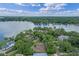 Majestic waterfront residences surrounded by greenery, offering exclusive lake access and breathtaking scenery at 446 Alberta Dr, Winter Park, FL 32789