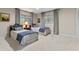 Comfortable bedroom featuring two beds, neutral carpet, and two windows at 446 Alberta Dr, Winter Park, FL 32789